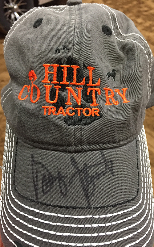 George Strait signature on Hill County Tractor hat